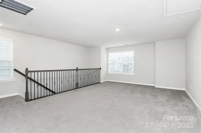 a view of a livingroom with a staircase