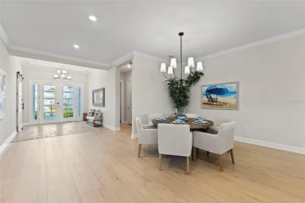 a view of a dining room with furniture window and outside view
