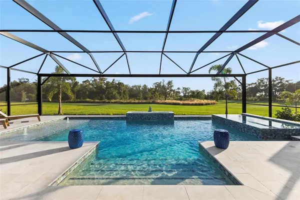 an aerial view of a house with a garden