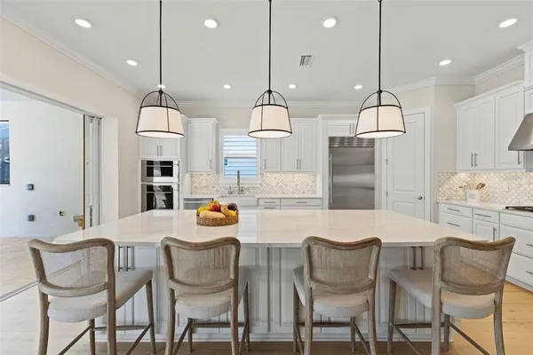 a view of a swimming pool with a yard