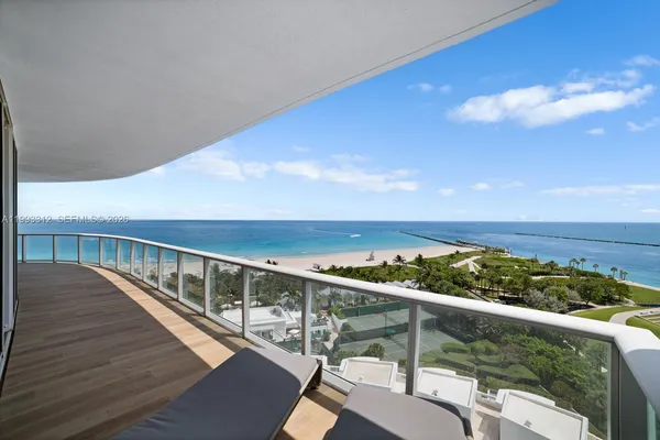 a view of balcony with furniture