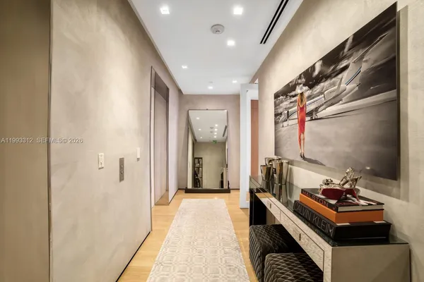 a room with furniture and gym equipment