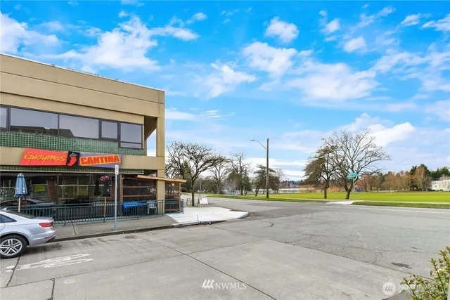 a view of a building with a street