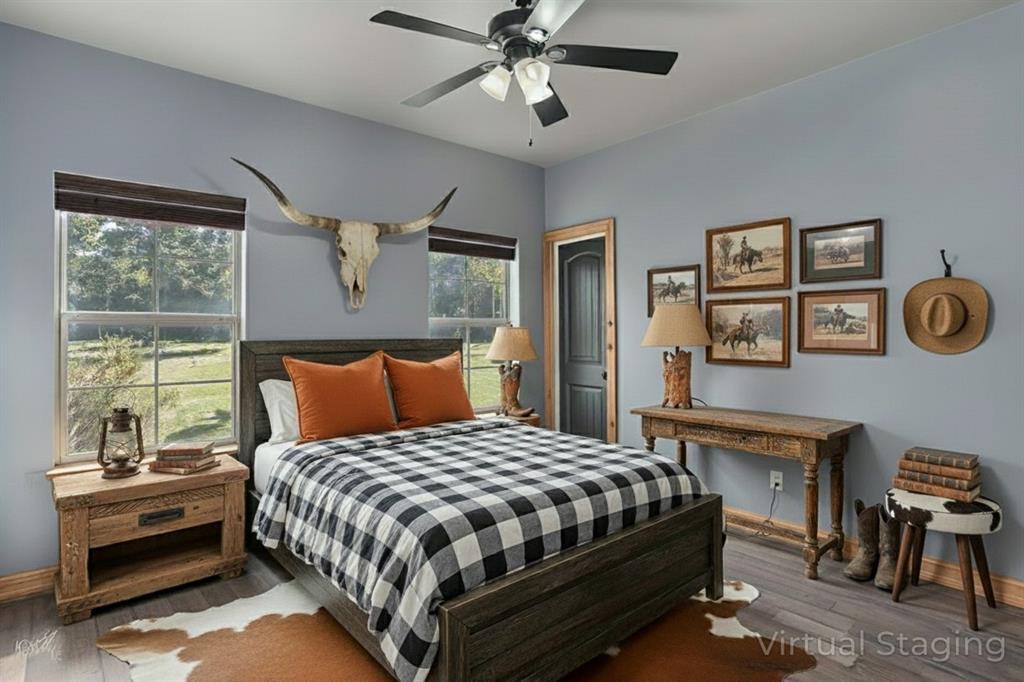 550 Linton Bellevue Road Benton, LA 71006 - Photo 19 of 37 Bedroom featuring wood finished floors and ceiling fan