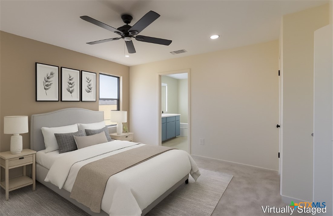 286 South Baese Road Elm Mott, TX 76640 - Photo 12 of 23 a bedroom with a bed and a ceiling fan