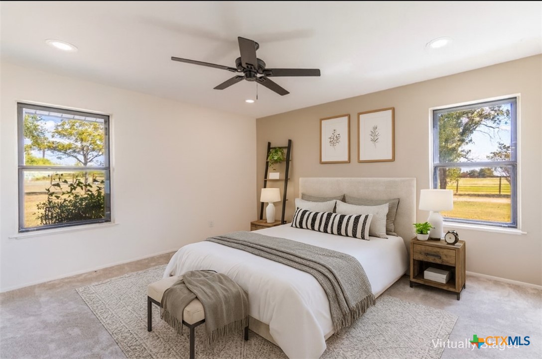 286 South Baese Road Elm Mott, TX 76640 - Photo 18 of 23 a bedroom with a bed and a window