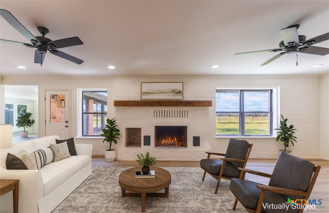 286 South Baese Road Elm Mott, TX 76640 - Photo 3 of 23 a living room with furniture fireplace and window