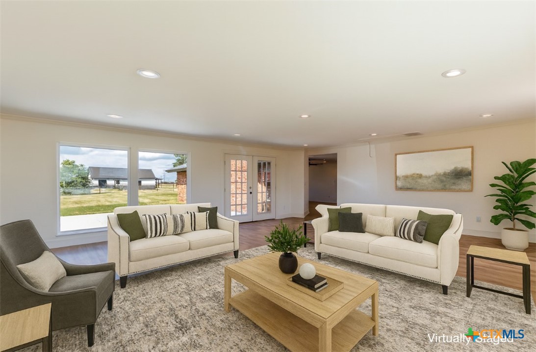 286 South Baese Road Elm Mott, TX 76640 - Photo 10 of 23 a living room with furniture and a large window