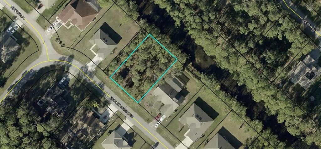 15 Rippling Brook Drive Palm Coast, FL 32164 - Photo 1 of 3 an aerial view of a house with a yard