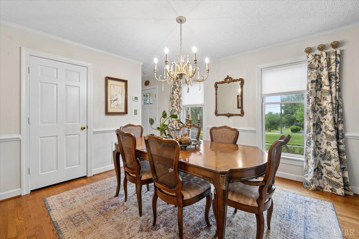 3289 Peaks Road Bedford, VA 24523 - Photo 26 of 71 a view of a dining room with furniture and chandelier