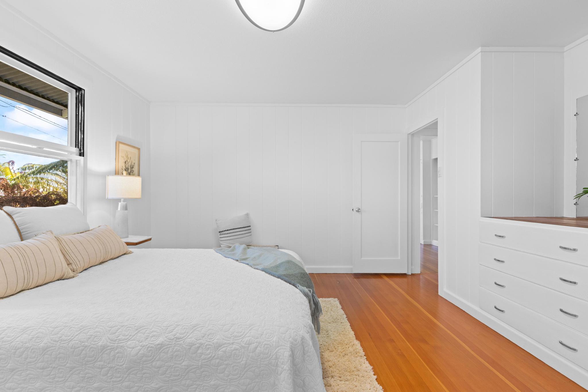 53 Ekaha Street Hilo, HI 96720 - Photo 15 of 29 a bedroom with a bed and a dresser