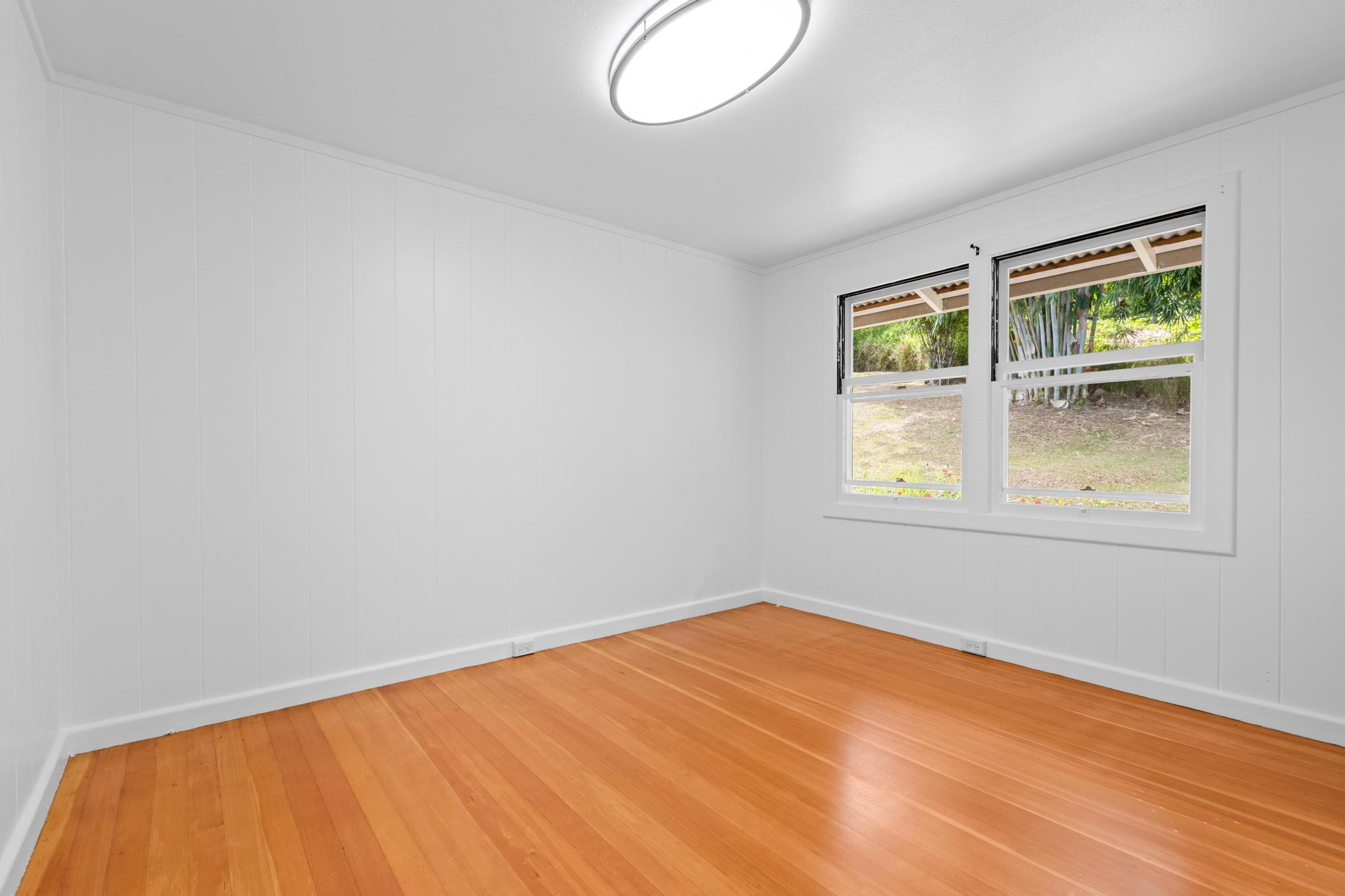 53 Ekaha Street Hilo, HI 96720 - Photo 18 of 29 an empty room with windows