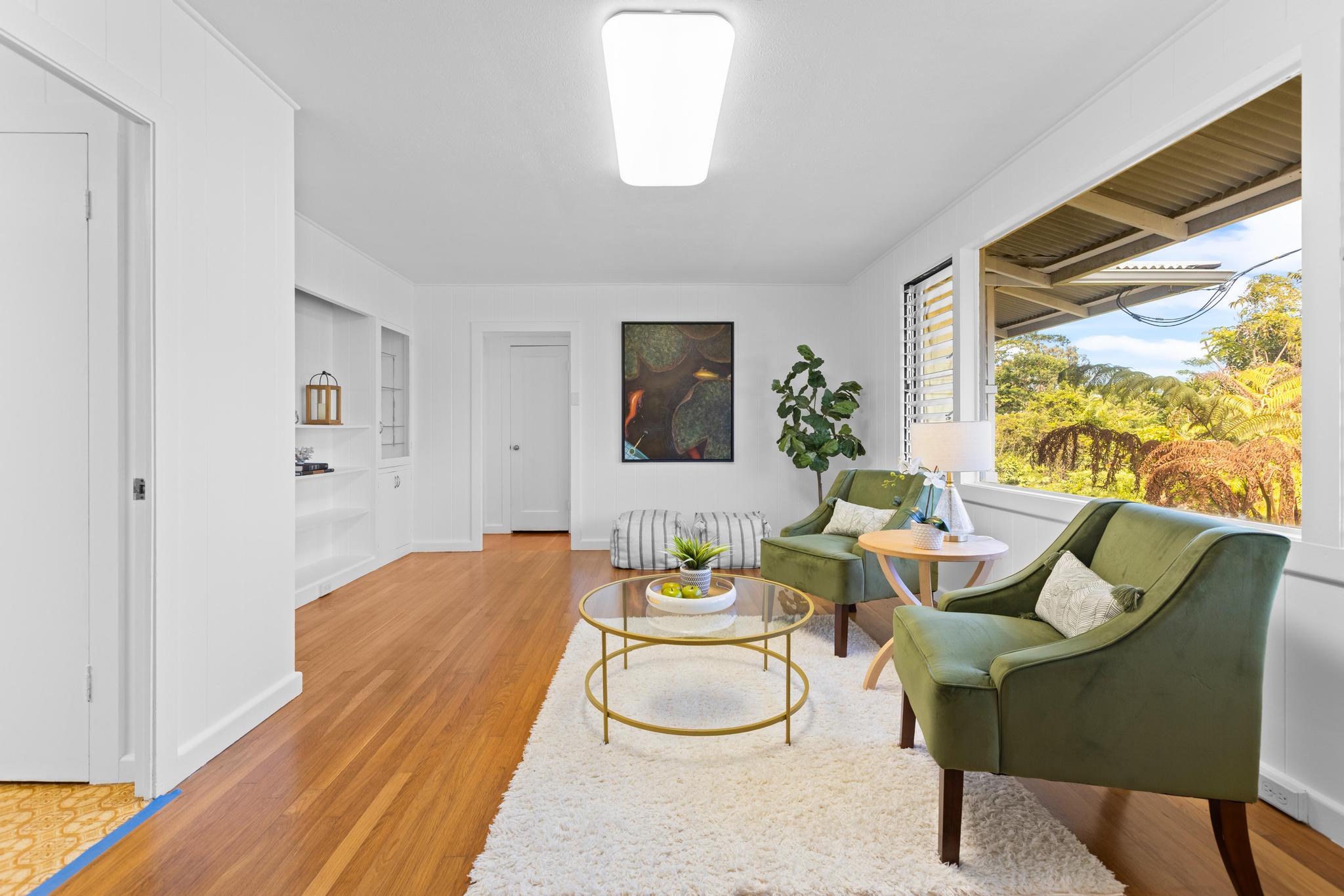 53 Ekaha Street Hilo, HI 96720 - Photo 2 of 29 a living room with furniture and a window
