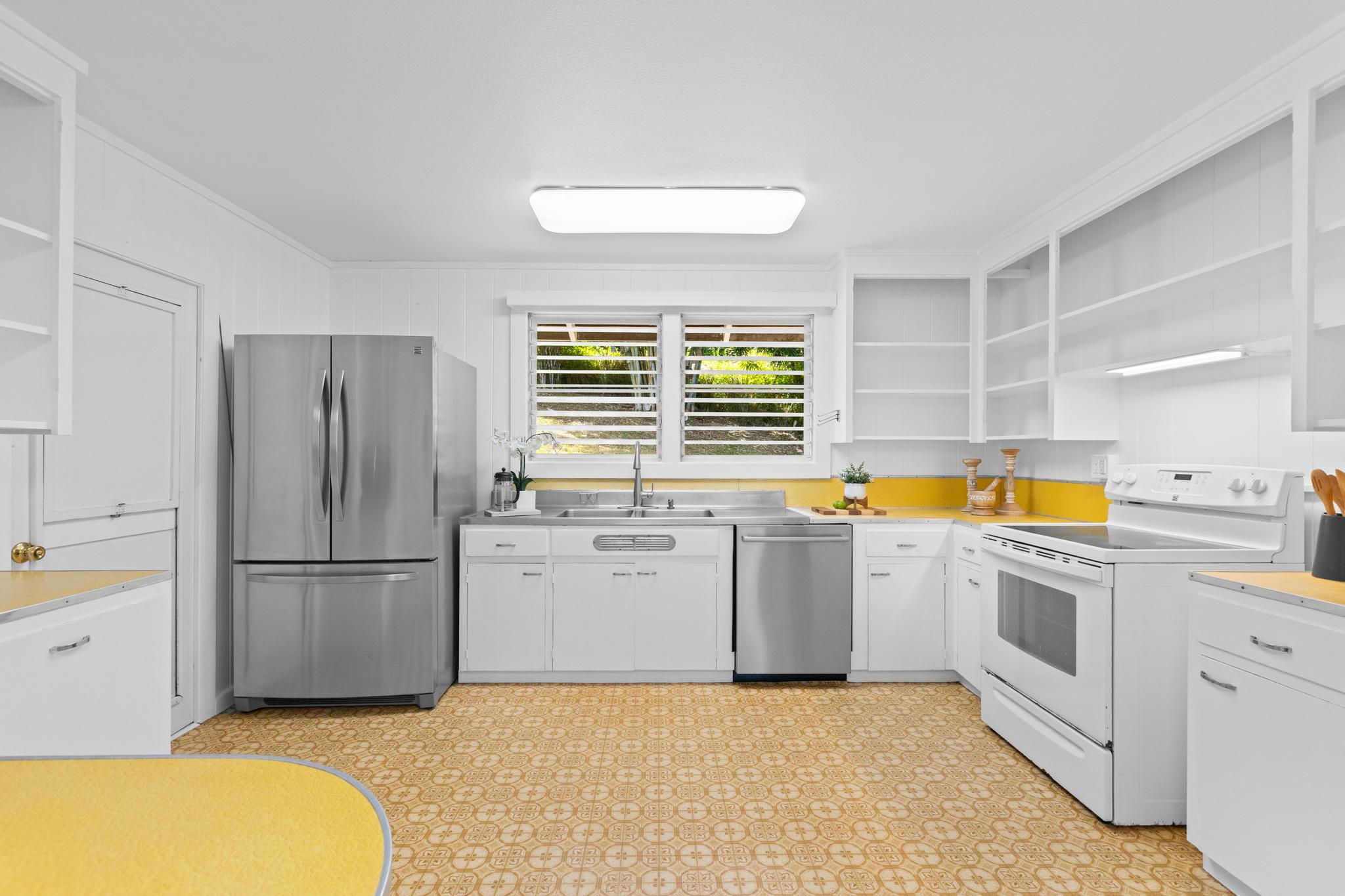 53 Ekaha Street Hilo, HI 96720 - Photo 4 of 29 a kitchen with a sink appliances and cabinets
