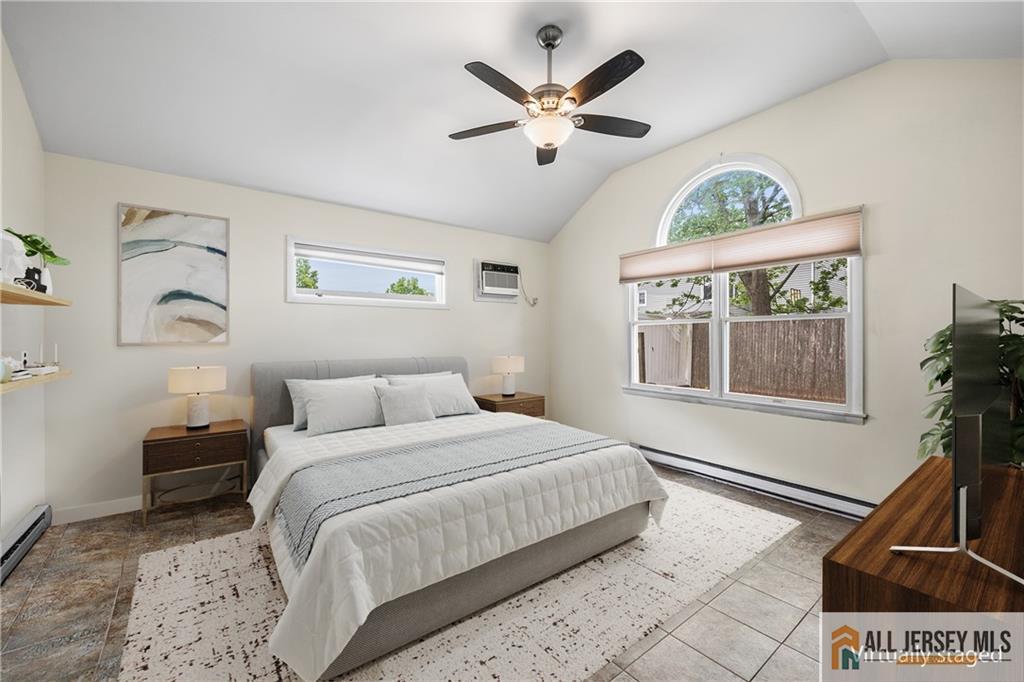 67 Drake Place Colonia, NJ 07067 - Photo 22 of 31 a bedroom with a large bed and a window