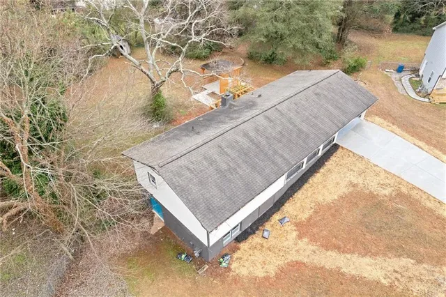 a white building with glass top door