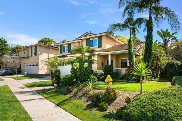 a house view with a garden space