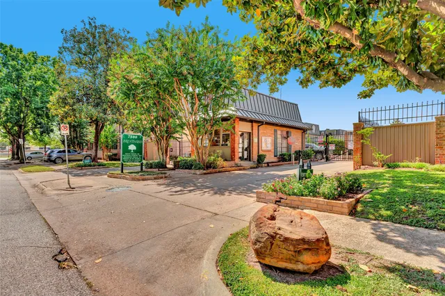 a view of a street with houses