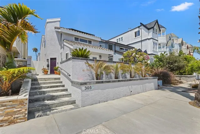 a view of a building with a potted plant and a large windows