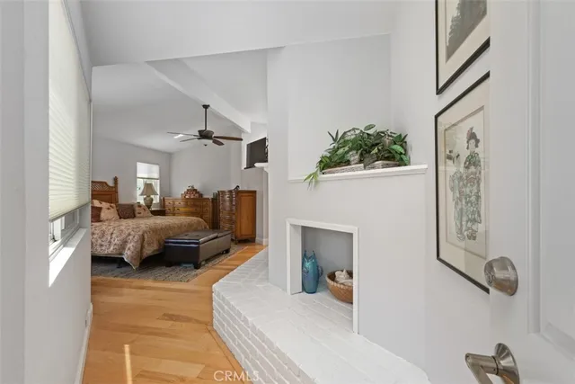 a bedroom with furniture and a chandelier