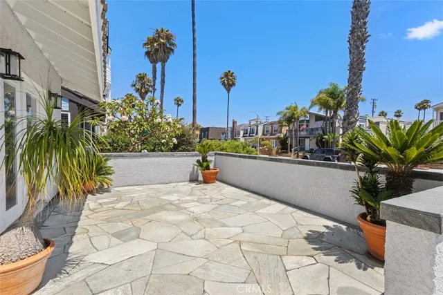 a swimming pool with outdoor seating