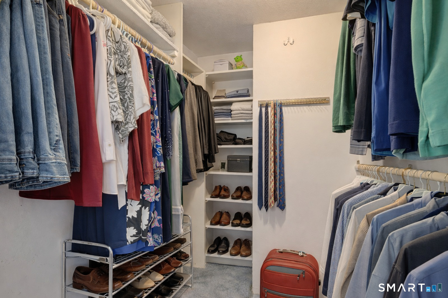 28 Berldale Avenue Berlin, CT 06037 - Photo 18 of 40 Enjoy the walk in closet in the primary bedroom for all your wardrobe needs