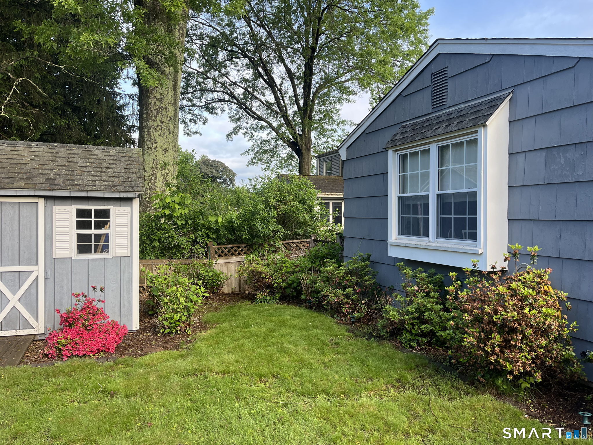 28 Berldale Avenue Berlin, CT 06037 - Photo 37 of 40 2025 Spring side yard and shed