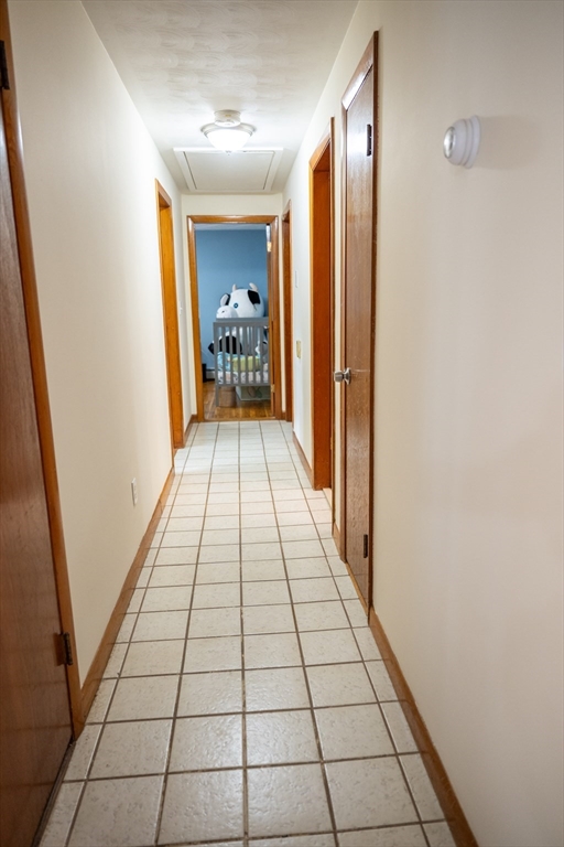 10 Chris Road Oxford, MA 01540 - Photo 17 of 42 a view of gallery with wooden floor