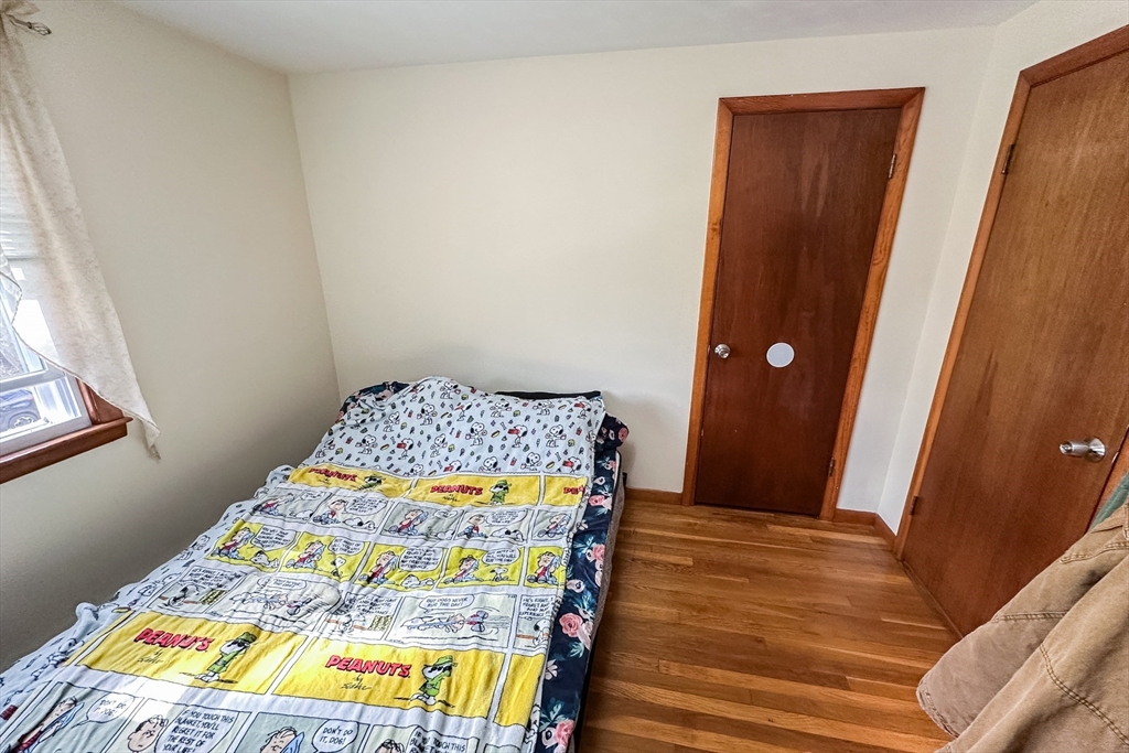 10 Chris Road Oxford, MA 01540 - Photo 25 of 42 a bedroom with a bed and a window