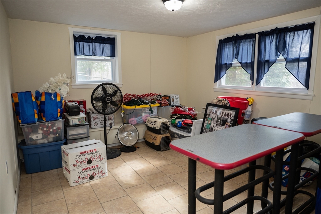 10 Chris Road Oxford, MA 01540 - Photo 30 of 42 a view of a room that has a bed and toys