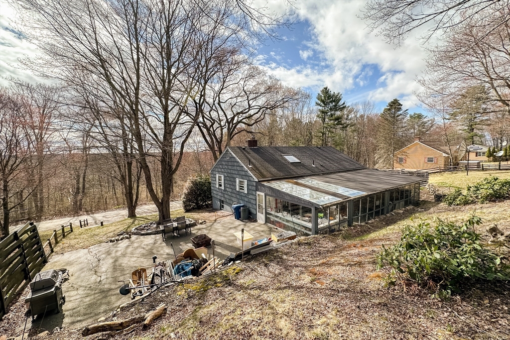 10 Chris Road Oxford, MA 01540 - Photo 42 of 42 a view of house with yard and covered with snow