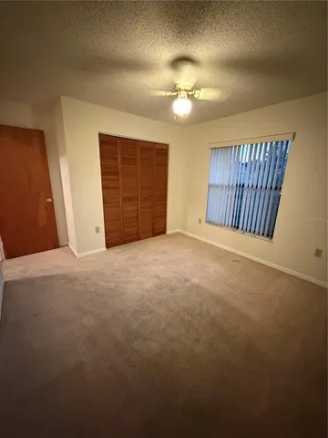 wooden floor with a bathroom