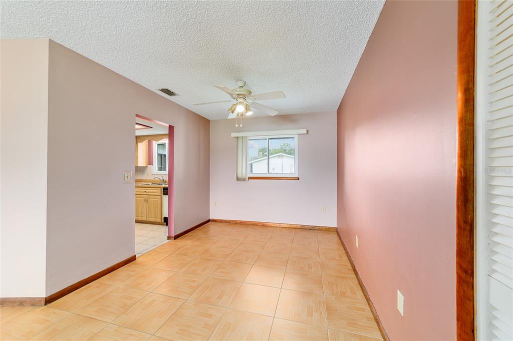 9841 Southwest 102nd Place Ocala, FL 34481 - Photo 22 of 66 an empty room with windows and closet