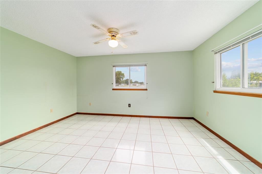 9841 Southwest 102nd Place Ocala, FL 34481 - Photo 38 of 66 a view of an empty room with a window