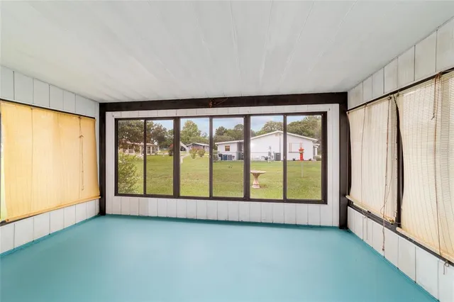 a view of a yard with a garage