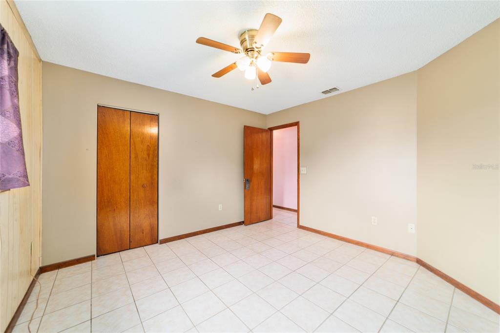 9841 Southwest 102nd Place Ocala, FL 34481 - Photo 47 of 66 a view of an empty room