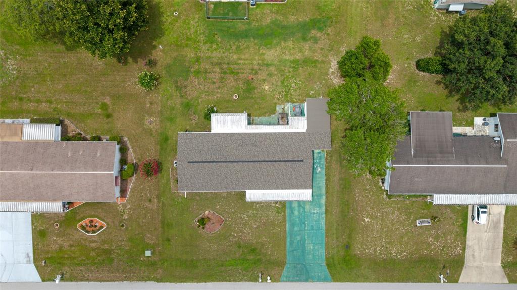 9841 Southwest 102nd Place Ocala, FL 34481 - Photo 61 of 66 an aerial view of residential house with outdoor space and trees