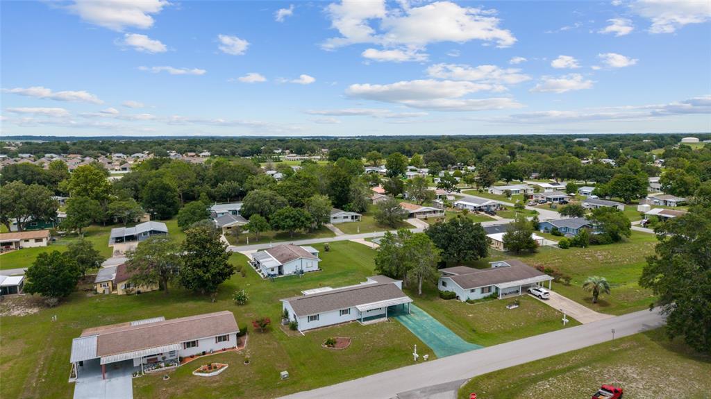 9841 Southwest 102nd Place Ocala, FL 34481 - Photo 65 of 66 an aerial view of a house with a garden