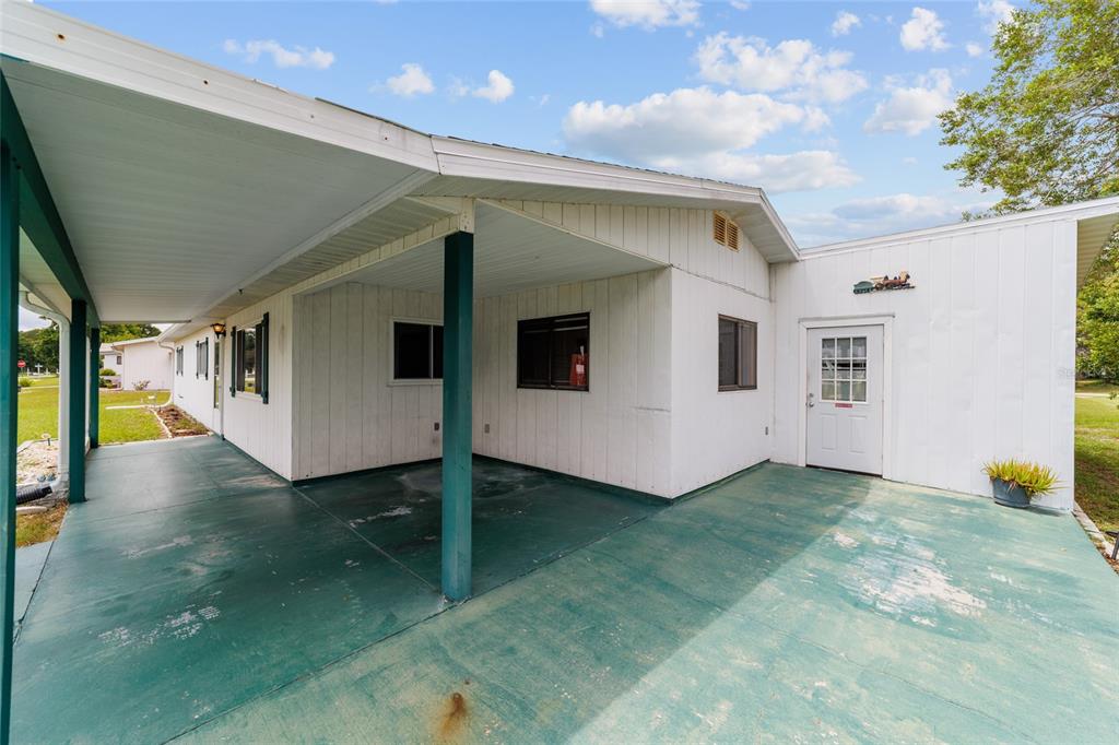9841 Southwest 102nd Place Ocala, FL 34481 - Photo 7 of 66 a view of a porch