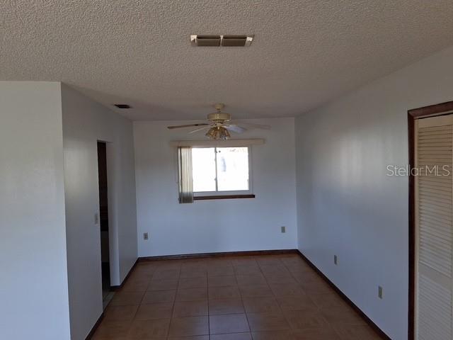 9841 Southwest 102nd Place Ocala, FL 34481 - Photo 9 of 66 an empty room with a window