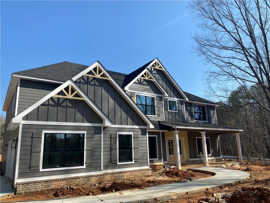 415 Kinney Lake Road Carrollton, GA 30116 - Photo 1 of 1 a front view of a house with a yard
