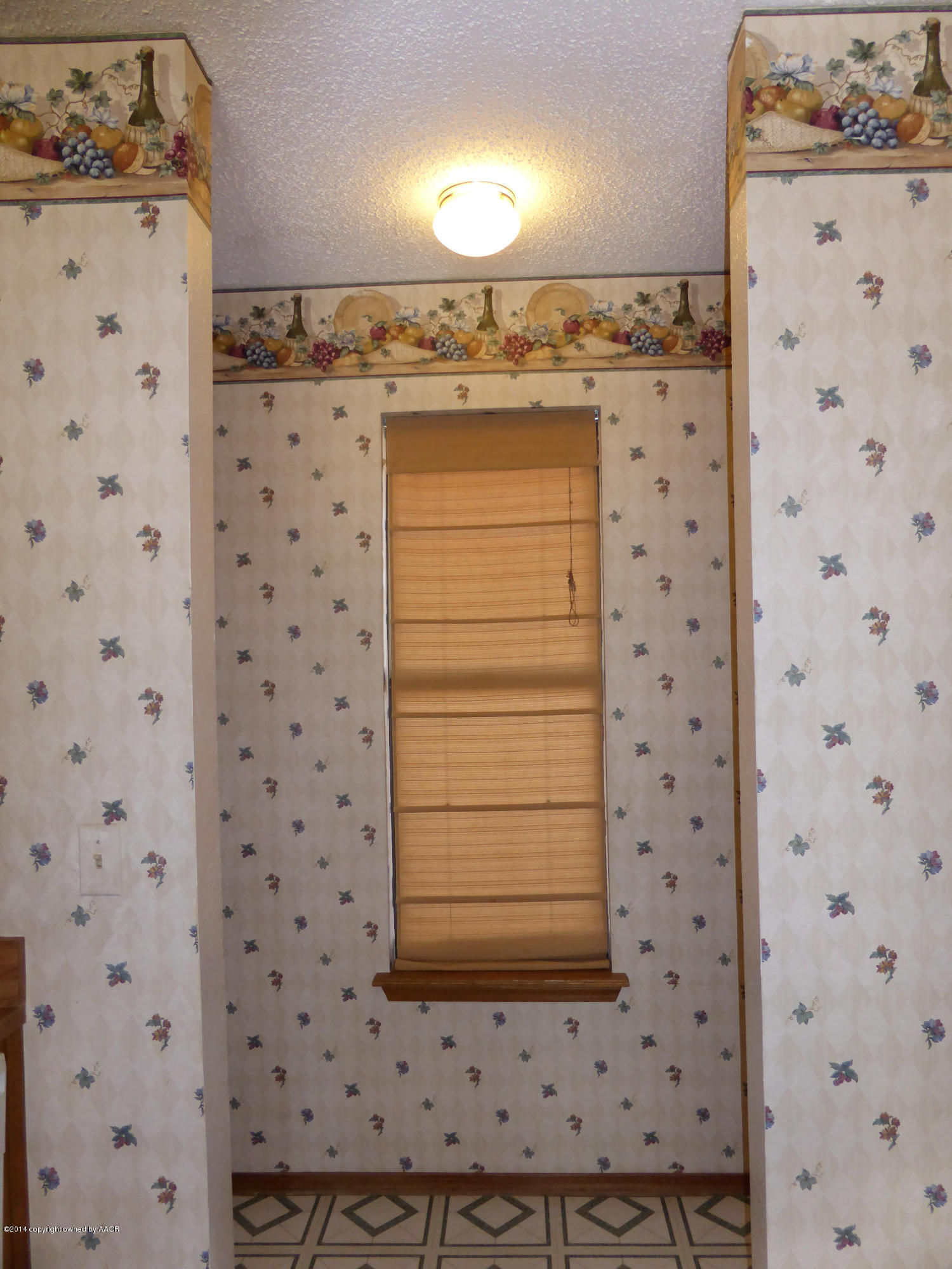 8112 Marni Trail Amarillo, TX 79110 - Photo 18 of 22 a bathroom with a granite countertop sink a mirror and shower