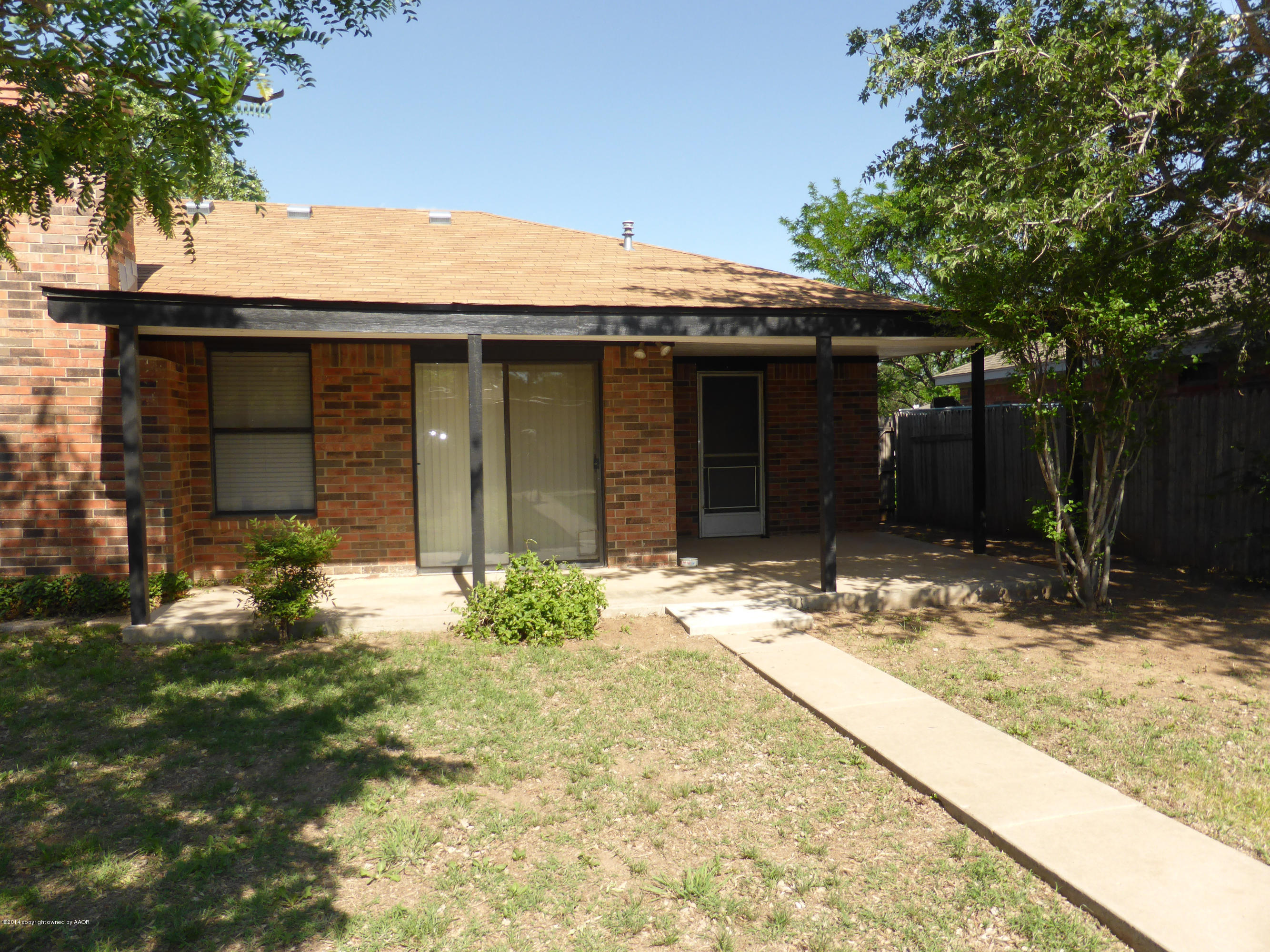 8112 Marni Trail Amarillo, TX 79110 - Photo 21 of 22 a view of a house with a yard