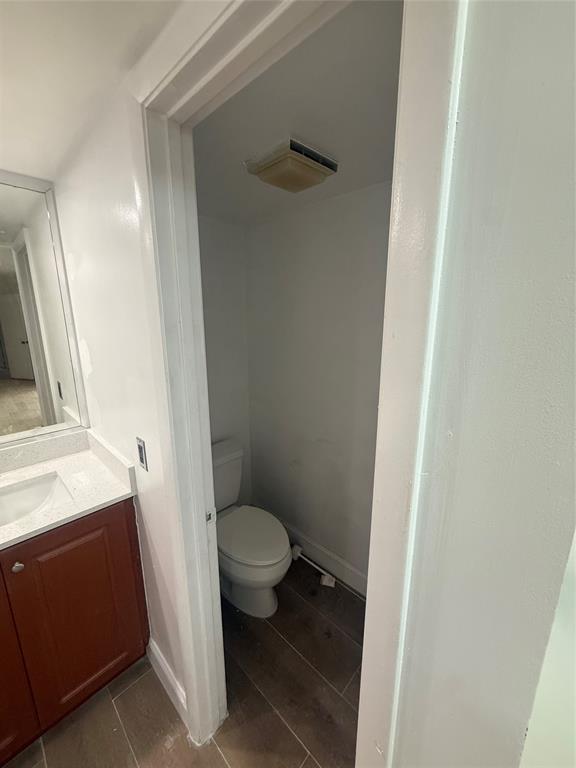 9138 Southwest 23rd Street, Unit B Davie, FL 33324 - Photo 17 of 21 a bathroom with a sink and a toilet