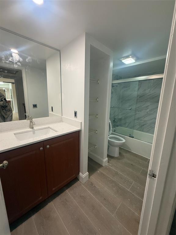 9138 Southwest 23rd Street, Unit B Davie, FL 33324 - Photo 9 of 21 a spacious bathroom with a double vanity sink toilet and shower