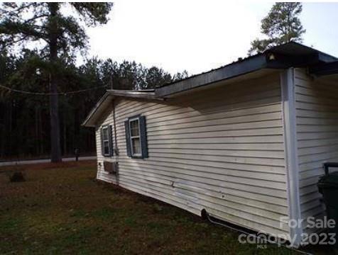 784 Gilbert Road Conway, SC 29527 - Photo 5 of 6 a view of a house with a yard