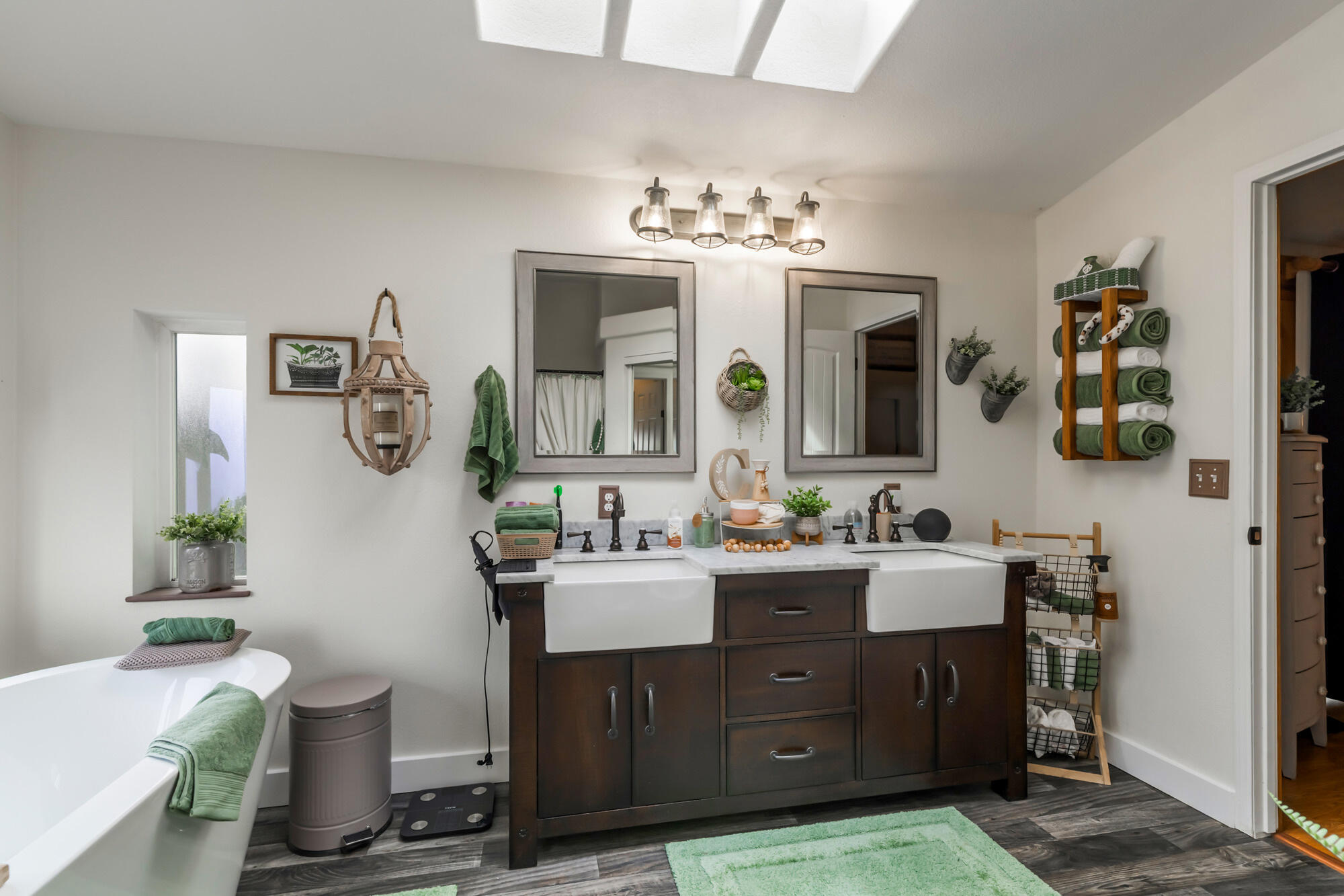 7400 South Prairie Road Tillamook, OR 97141 - Photo 22 of 62 a bathroom with a double vanity sink mirror and toilet