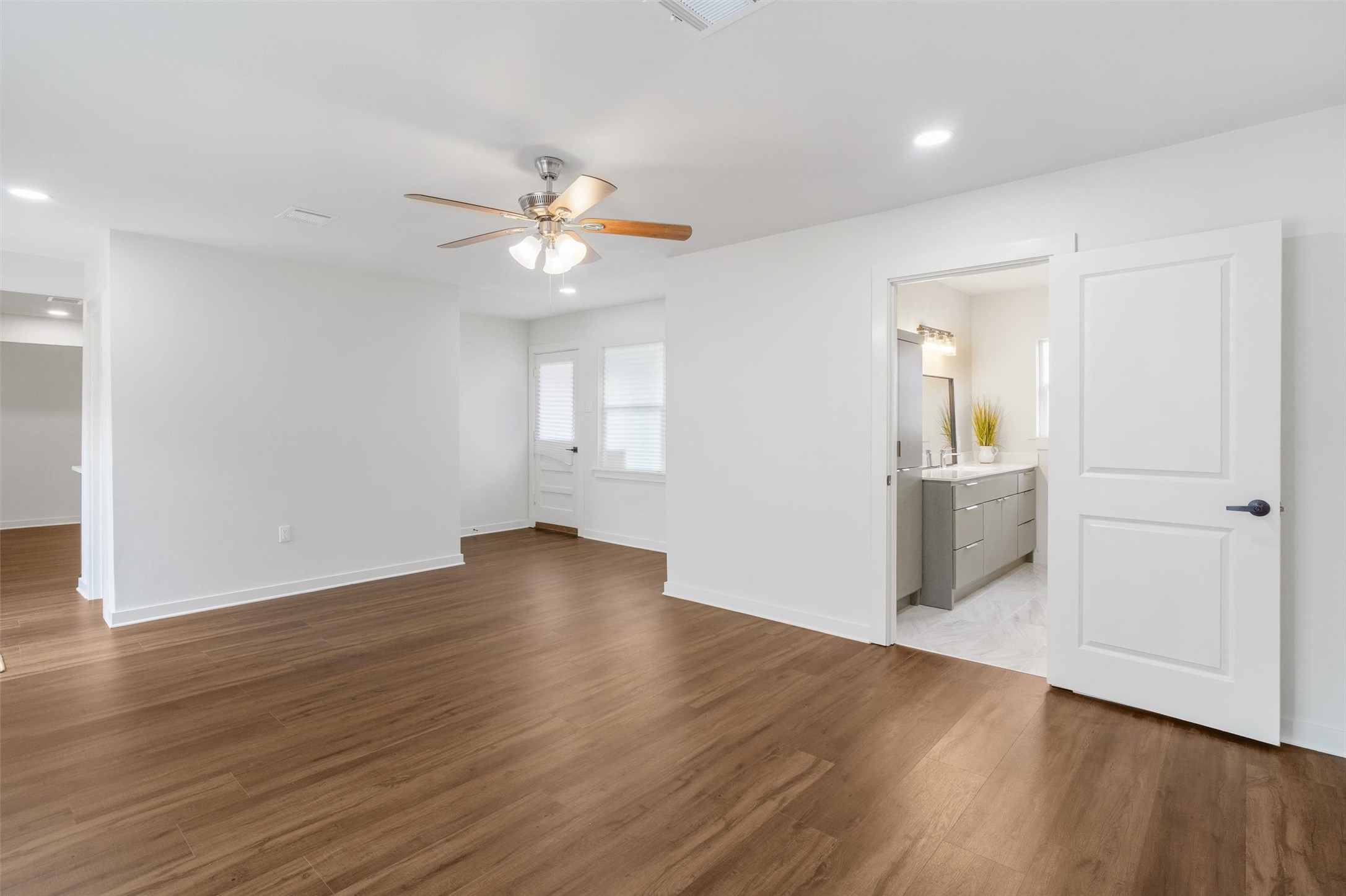 1801 Harding Street Pasadena, TX 77502 - Photo 15 of 22 wooden floor in an empty room with a window