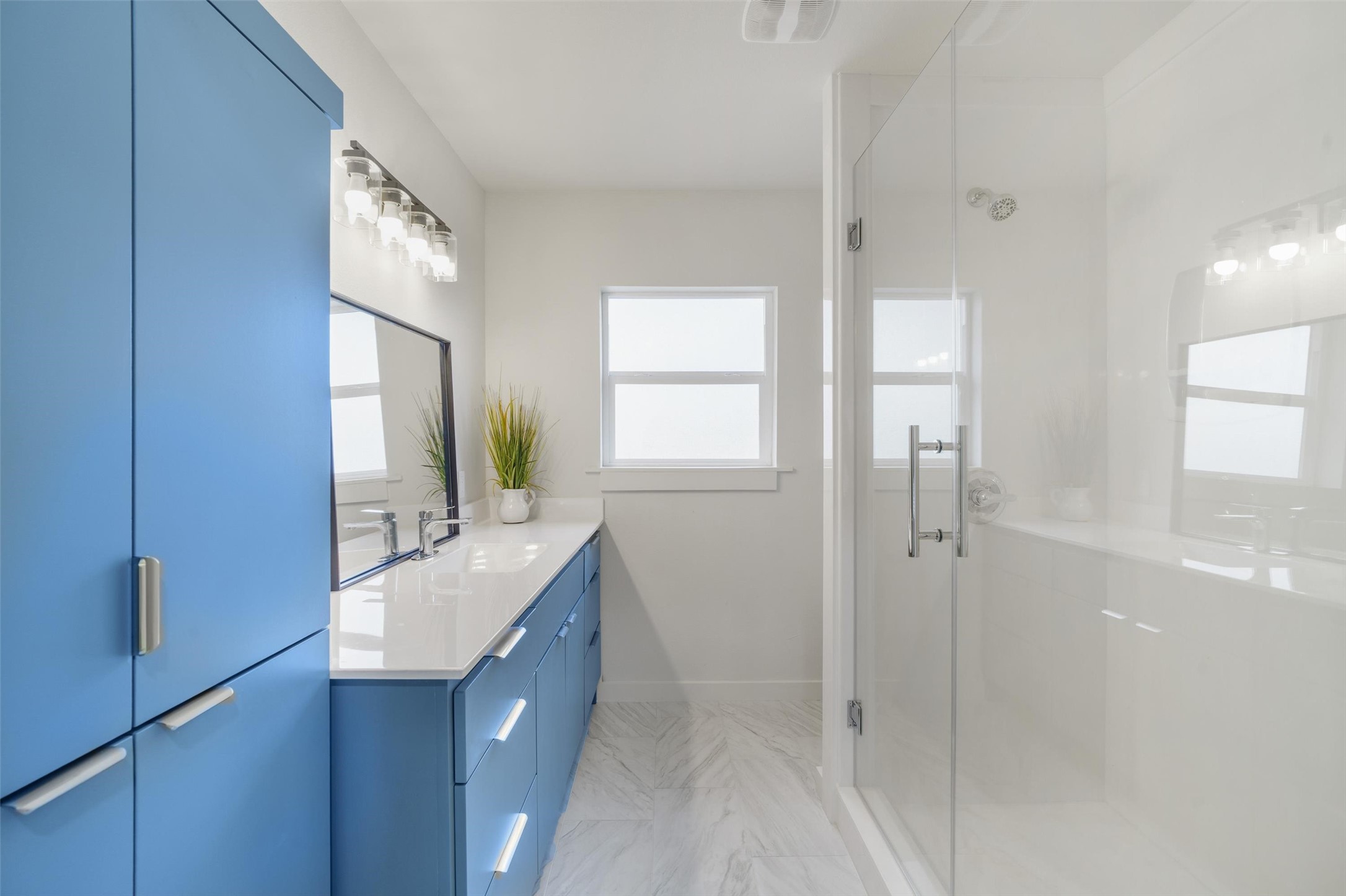 1801 Harding Street Pasadena, TX 77502 - Photo 16 of 22 a bathroom with a granite countertop sink a mirror and a shower