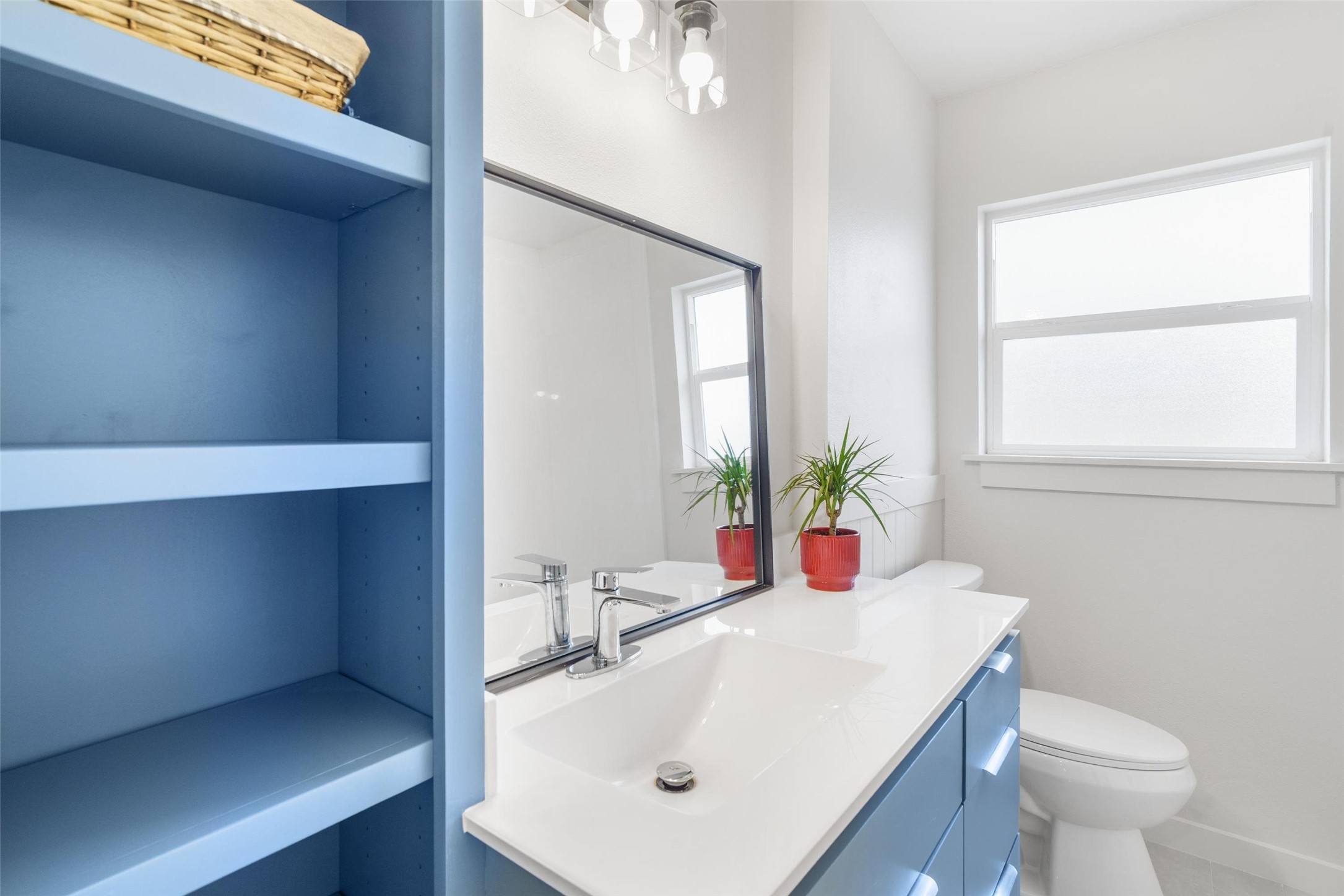 1801 Harding Street Pasadena, TX 77502 - Photo 19 of 22 a bathroom with a sink a toilet and window